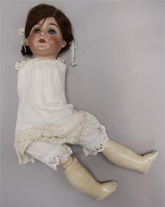 A German bisque head doll Queen Louise (a.f.).